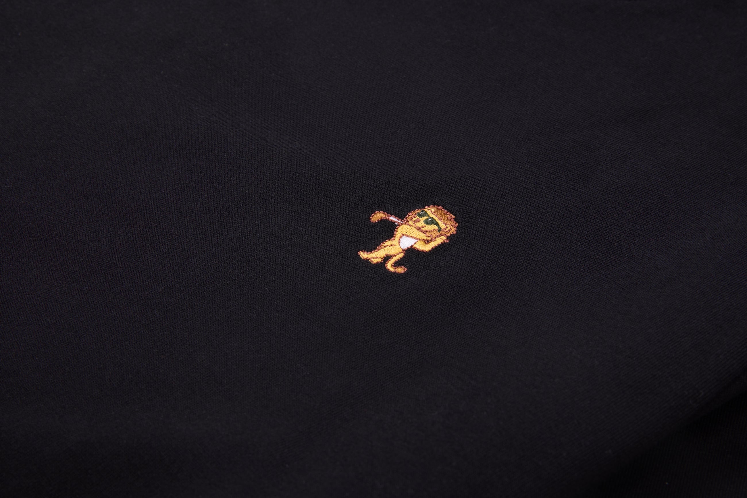 Performance Knit Polo – Onyx | Lion Collection
